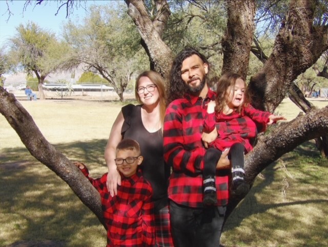 Photo of Isaac and Amanda with their kids.