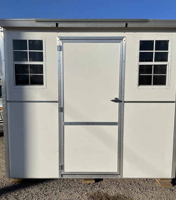 Photo of a sleeping quarters building used for sheltering the unhoused.