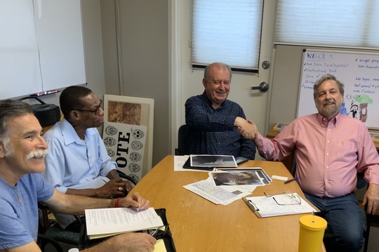 Photo Of Councilman Dahl shaking hands with members of the Western WInds Homeowners association.