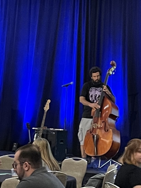 Phot of Ward 3 Council Aid CJ Boyd playing the bass.