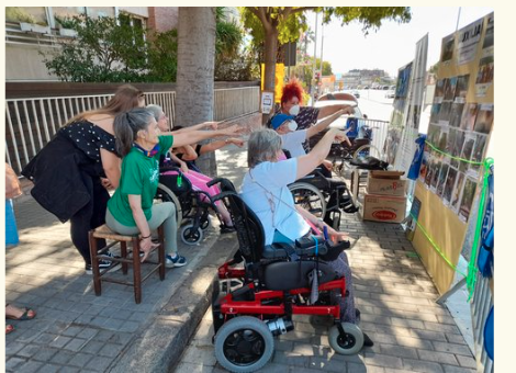 Picture of women looking at pictures