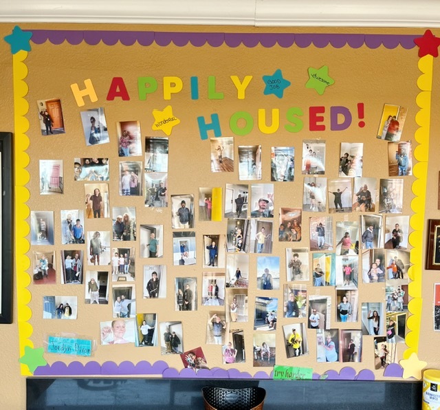 Photo of a wall of pictures celebrating residents at the Wildcat Inn.