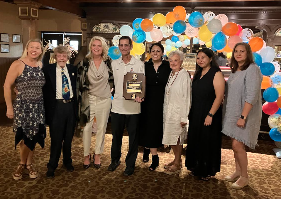 Picture of Heather, Mark, Heidi, Steve K, Diana, Ann, Nadia, Dora at the Lions Club 100-year anniversary event (left to right)