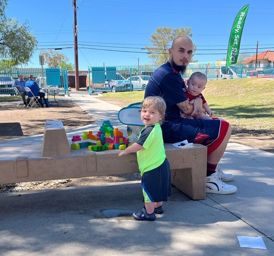 Photo of Juan and his cute kids enjoying the big building blocks from Ready, Set, Rec! at the Balboa event.