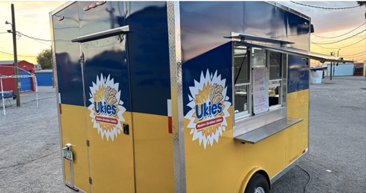 Picture of Ukies food truck with blue and yellow paint on it