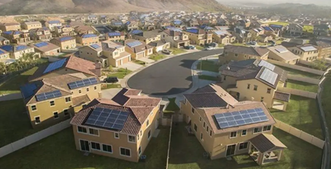 Picture shows some houses in one area with solar panel on their roofs