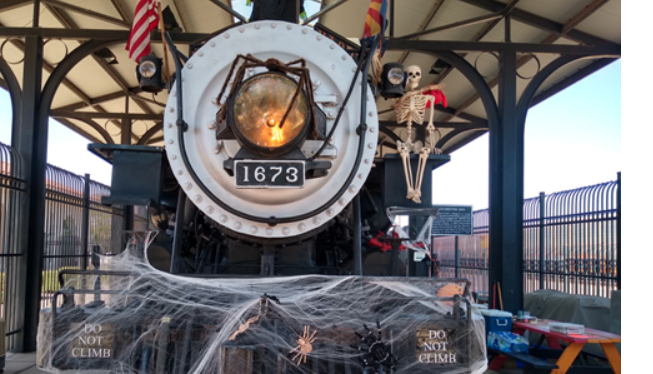 Picture of the historic train year 1673 with halloween decoration in front of it
