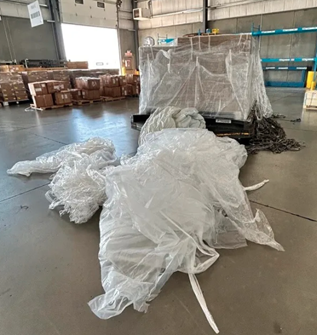 Picture of piles of plastic wrap in a store room