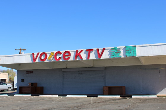 Photo of the Exterior of the Voice KTV building in the daytime.