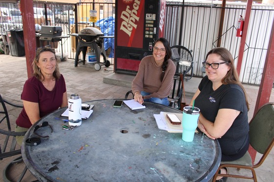 Photo of Ward 3 Chief of Staff Katie Bolger, Council Aide Marlene Avelino, and Community Services Manager Allison Chappell at the Wildcat Inn.