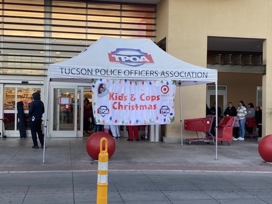 Photo of the TPD kids and cops Christmas.