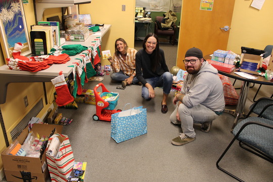 Photo of the Ward 3 team getting donations ready for the Wildcat Inn Holiday party.