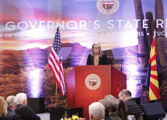 Photo of Arizona Governor Katie Hobbs giving the State of the State address at the Tucson Convention center.