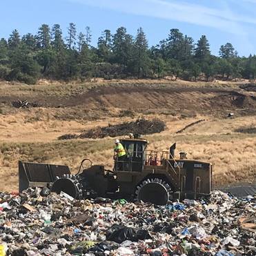 Picture of large amounts plastic waste in a landfill