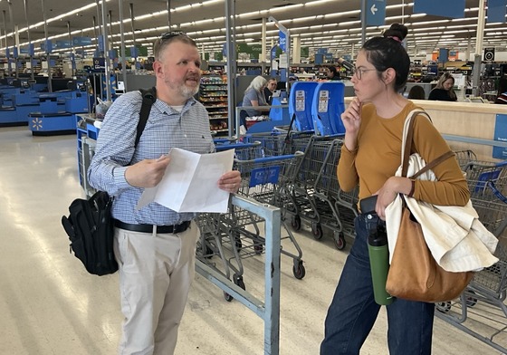 Photo of Ward 3 Council Aide Marlene Avelino and Walmart representative in the Walmart store.
