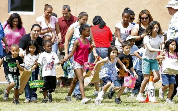 Photo of crowd at egg hunt in 2011.