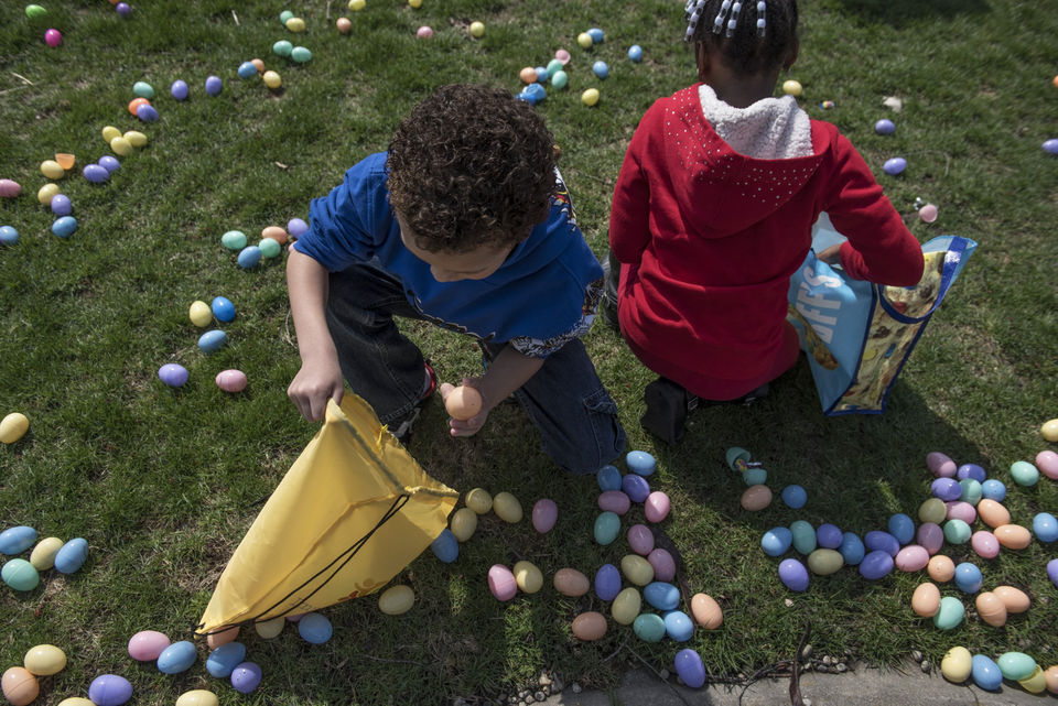 Photo of two kids at egg hunt.