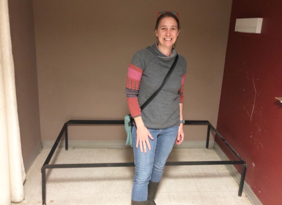 Photo of Tucson Housing and Community Development director Anne Cheneka inside one of the sleeping quarters.