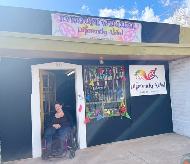 Photo of Jonni Campbell in front of the Differently Abled Entertainment studio in Balboa Heights.