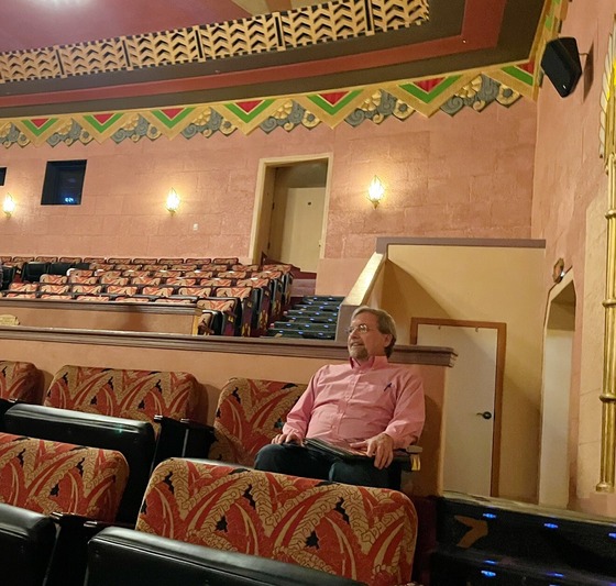 Photo of Vice Mayor Dahl in John Wayne's favorite seat in the house.