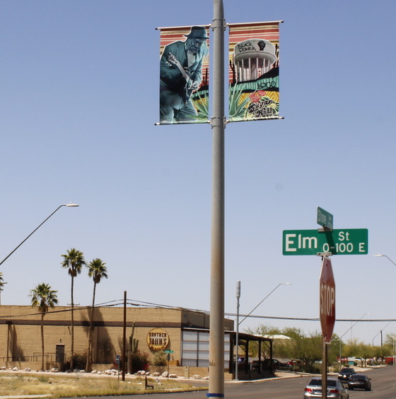 Photo: A banner on the corner of Elm St. and Stone Ave. featuring local musician Jack Anderson.