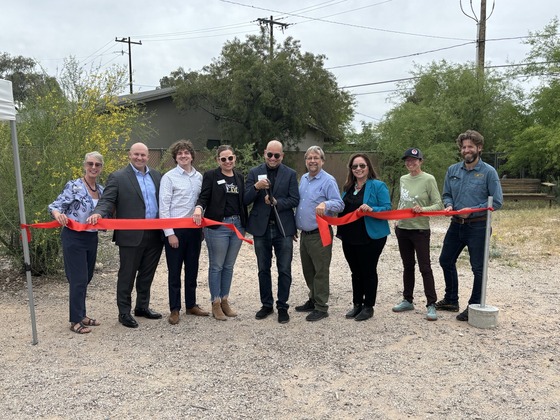 Photo of Ribbon cutting for solar panel installation at the Drawing Studio.