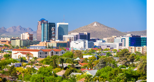 Wide shot of downtown Tucson on a sunny day, looking toward A Mountain.