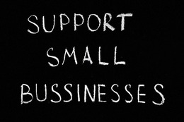 Support Small Businesses Sign that looks like chalk on a chalkboard