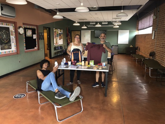 Photo of St. Francis Shelter volunteers at the cooling center in the Ward 3 Community Room.