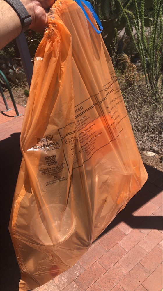 Photo of an orange Hefty Renew bag.