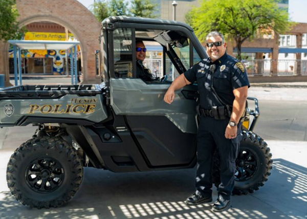 Two TPD officers, one inside, one outside, a Side-by-Side outside the Ronstadt Transit Center.