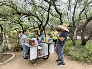 Photo of folks having fun at the book bike