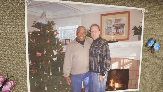 photo of Christmas 15 years ago pinned over Jeffrey's desk.
