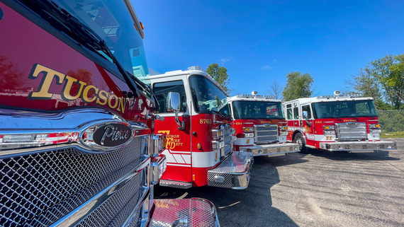 Close up of four new fire trucks
