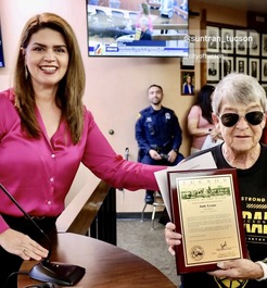 Picture of Mayor Romero with Judy Leone.