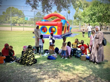 Family during a 29th Street Thrive community event