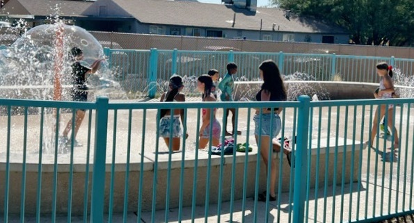 Photo of kids in splash pad.