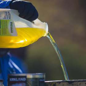 Grease pouring out of container
