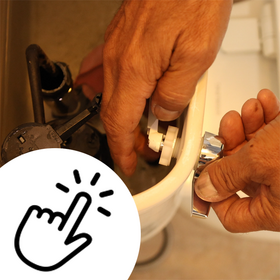 hands fixing toilet lever