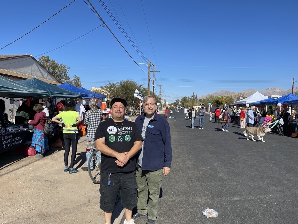 Photo of Vice Mayor Dahl with Amphi President Joseph Wilkison at the ”Taste of Amphi” & artisan market. 