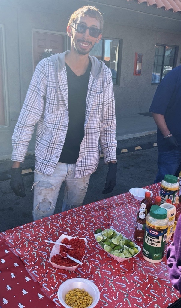 Photo of Zion Alderette at elote station.