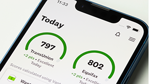 Credit scores from two agencies, TransUnion and Equifax, as shown on a cell phone app.