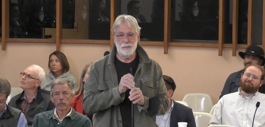 Photo of Corky Poster speaking at the City Council meeting