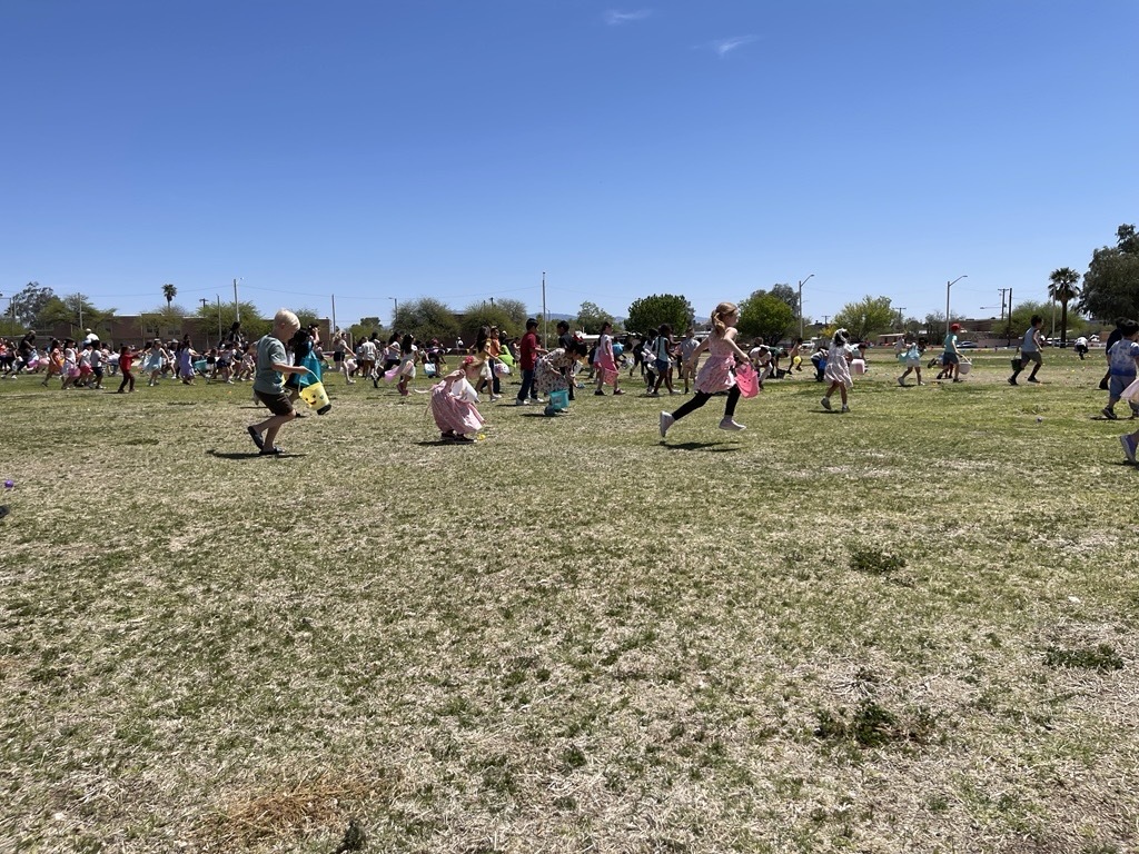 Photo of Kids running out to collect all the eggs!