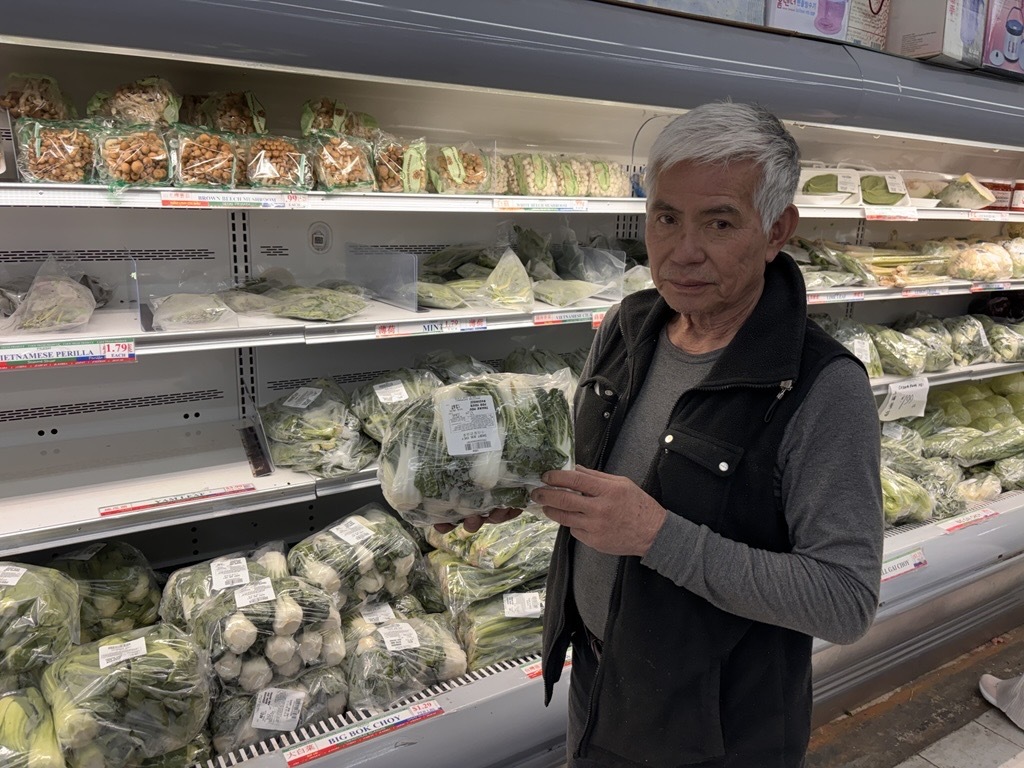 Photo of Jackson with vegetables.