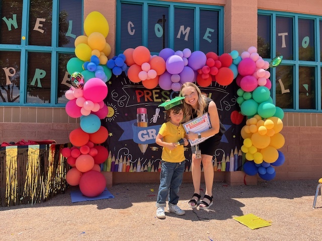 Photo of Marlene's son being allowed to walk during the pre-k graduation even though he had one more year to go. 