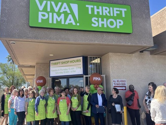 Ribbon cutting at VIVA PIMA! Thrift shop with some volunteers and staff 