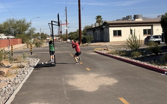 Phot of constituents  playing basket ball at 11th and Flores.