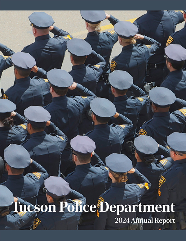 Cover of TPD 2024 Annual Report. Officers in dress uniform in rows 5 deep salute as LPO Adam Buckner's funeral procession passes.