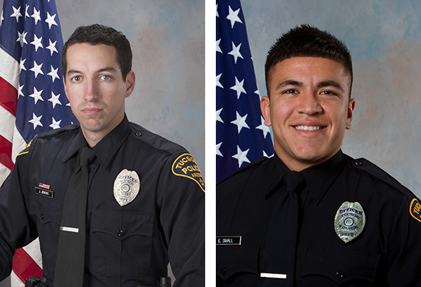 Department photos of two male officers in uniform in front of American flags.